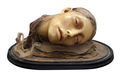 A 19TH CENTURY WAXWORK SEVERED HEAD OF A LADY