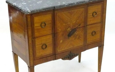 A 19thC marble top commode, having a kingwood and