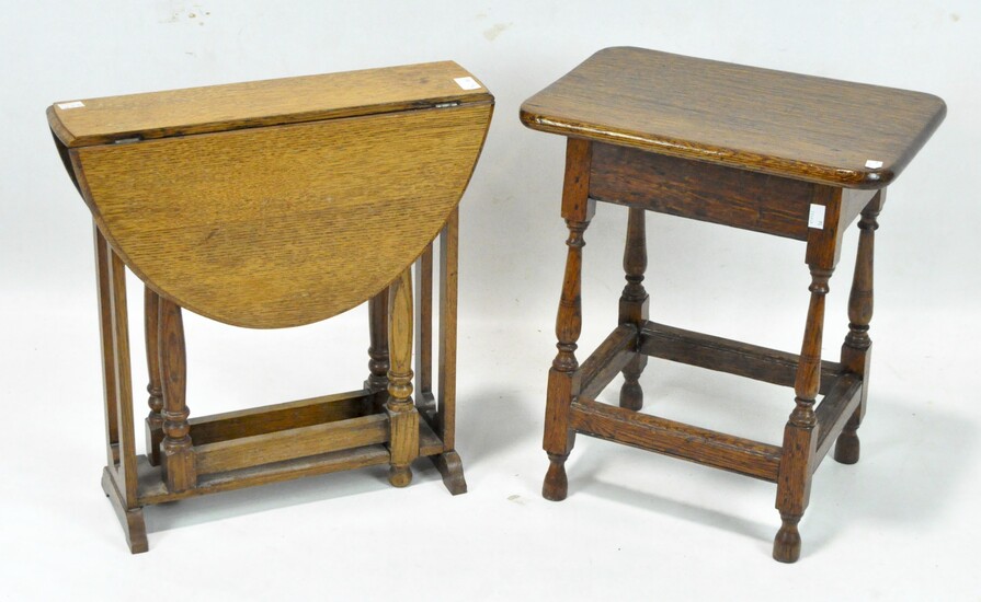 A 20th century oak occasional table, with tapered supports together with a folding gateleg table