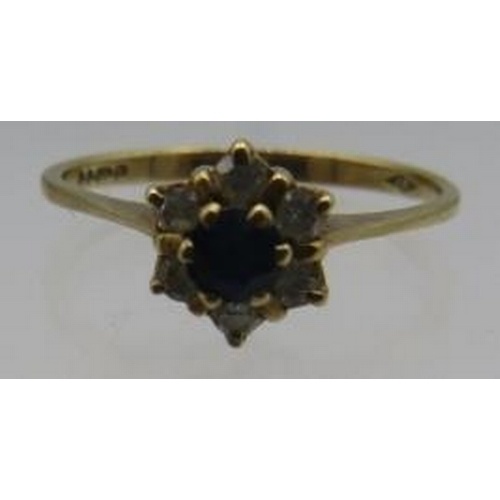 A 9ct yellow gold sapphire & diamond star shaped ring in cla...
