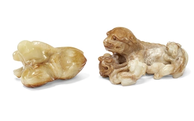 A BEIGE JADE CARVING OF A BIRD AND A WHITE AND RUSSET JADE CARVING OF A LION CHINA, QING DYNASTY OR LATER
