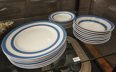 A BLUE AND WHITE CORNISHWARE PART DINNER SERVICE FOR EIGHT COMPRISING EIGHT DINNER PLATES, EIGHT BOWLS AND EIGHT SIDE PLATES, LEONAR...