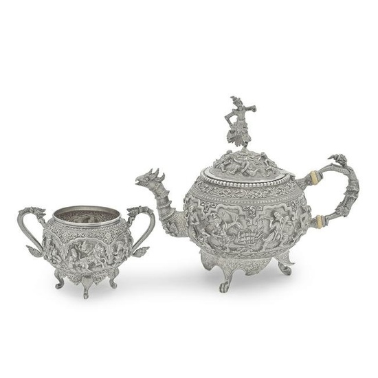 A Burmese silver teapot and twin-handled sugar bowl Lower Burma (Myanmar) circa 1900 (2)