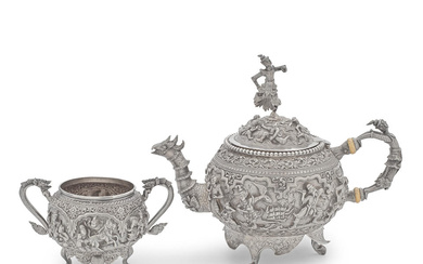 A Burmese silver teapot and twin-handled sugar bowl Lower Burma...