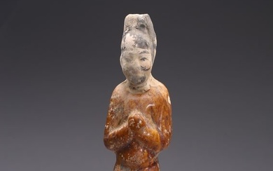 A CHINESE AMBER GLAZED FIGURE OF OFFICIAL