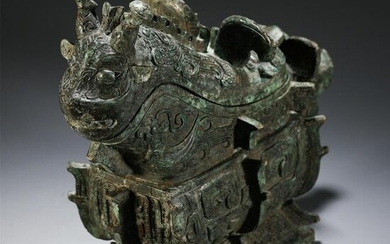A CHINESE ARCHAIC STYLE BRONZE LIBATION CUP