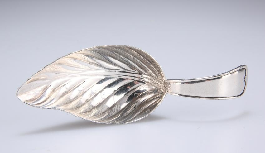 A CHRISTOFLE SILVER-PLATED CADDY SPOON, early 'GC'