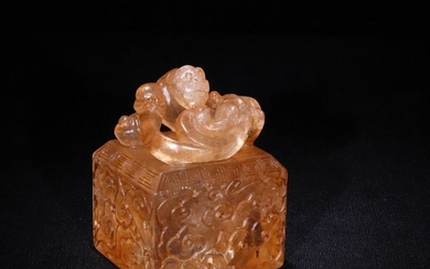 A CRYSTAL CARVED BEAST SHAPED SEAL