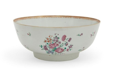 A Chinese Export Famille Rose armorial punch bowl