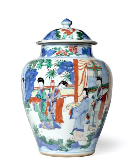 A Chinese Wucai Porcelain Jar and Cover, mid 17th century, of baluster form, painted with...