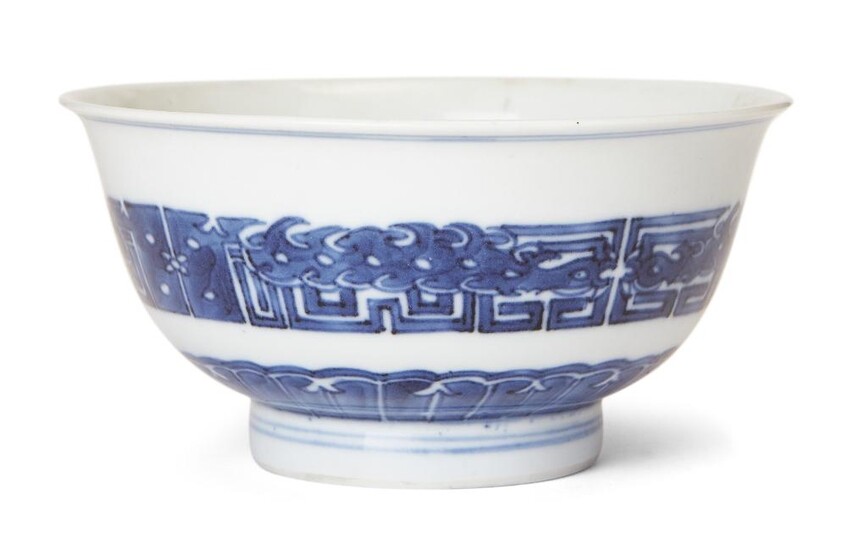 A Chinese blue and white bowl, 19th century, decorated to the exterior with an archaistic band, apocryphal four-character underglaze blue Xuande mark to base, 11.5cm diameter 十九世紀 青花繪仿古圖紋盌，青花「宣德年製」寄託款
