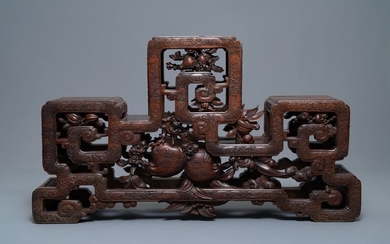 A Chinese finely carved wooden display stand, 19th...