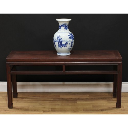 A Chinese hardwood low altar table, rectangular panel top, p...