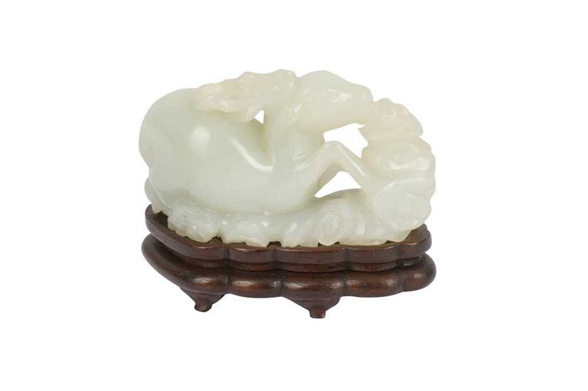 A Chinese pale celadon jade carving of a stag