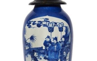 A Chinese porcelain blue and white 'dance performance' vase, Kangxi period, the front panel painted with a garden scene depicting a seated official flanked by attendants as a lady performs a dance, the reverse enclosing a fruiting peach tree amidst...