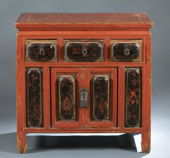 A Chinese red painted with lacquer panels cabinet.