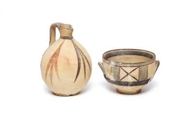 A Cypriot bichrome ware jug and a Cypriot white painted ware kylix