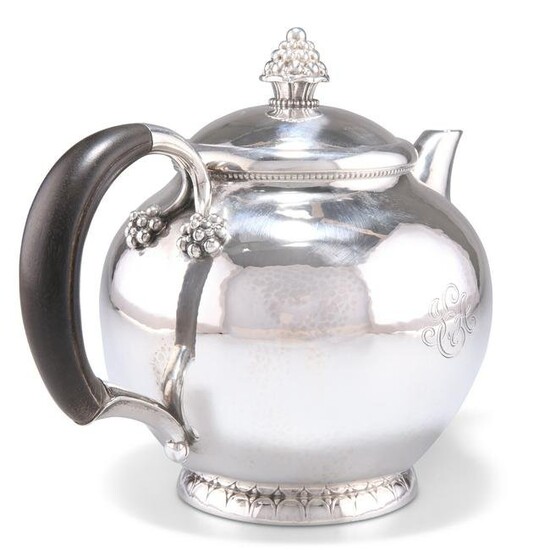 A DANISH STERLING SILVER TEAPOT, CIRCA 1930, by Georg