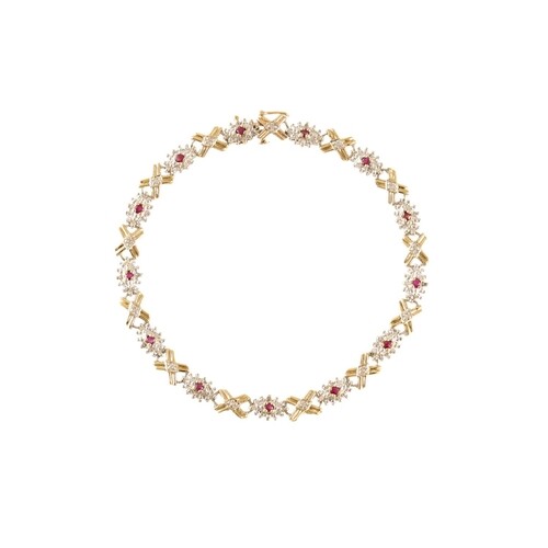 A DIAMOND AND RUBY CLUSTER BRACELET, mounted in gold