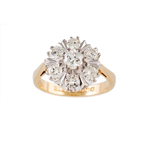 A DIAMOND CLUSTER RING, the brilliant cut diamonds mounted i...