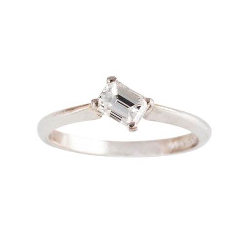 A DIAMOND SOLITAIRE RING, of cross over design, set with an ...