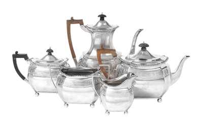 A Five-Piece Victorian Silver Tea and Coffee-Service by William Gibson and John Lawrence Langman, London, 1891, Retailed by Goldsmiths and Silversmiths Co. Ltd., London