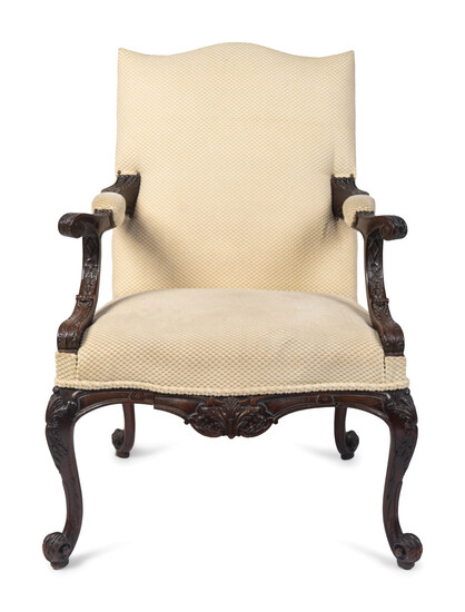 A George III Style Carved Mahogany Library Armchair