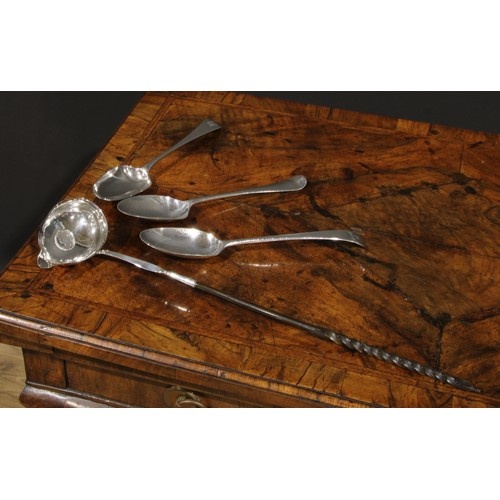 A George III silver toddy ladle, inset with coin, twisted ba...