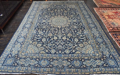 A HANDWOVEN PURE WOOL PERSIAN CARPET WITH FLORAL MOTIF 330 X 220CM