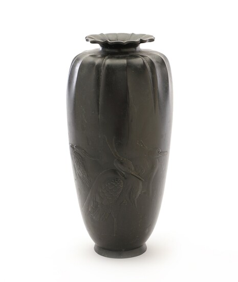 A Japanese patinated bronze vase. Signed. Miji 1868–1912. H. 45.5 cm.