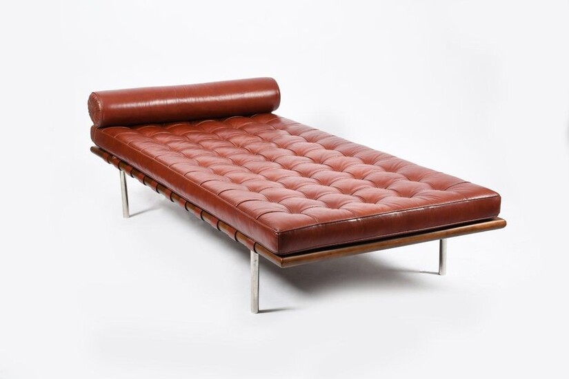 A Knoll Studio Barcelona day couch designed by Ludwig Mies Van Der Rohe, rectangular metal frame with padded Nasturtium leather cushion and padded leather headrest cushion, unsigned 196 x 96cm, 41cm high (3)