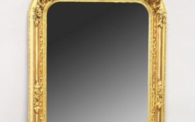 A LARGE ORNATE GILT FRAMED ARCH TOP MIRROR, the top