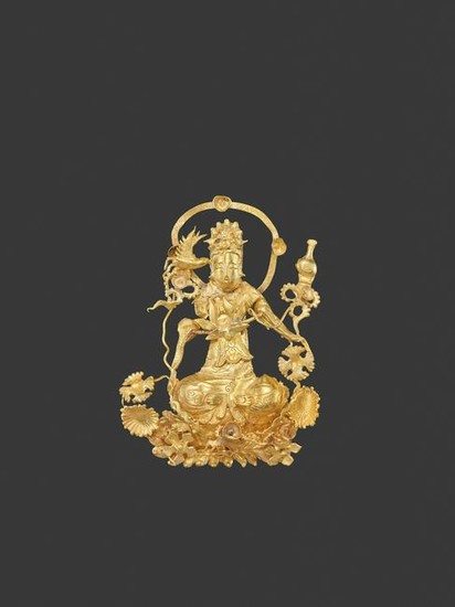 A LIAO DYNASTY GOLD REPOUSSE FILIGREE ORNAMENT