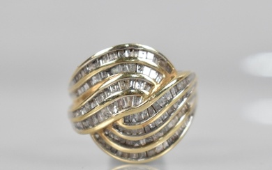 A Large Continental Diamond Mounted Dress Ring comprising Ei...