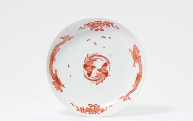 A Meissen porcelain dish with a red dragon and K.H.C. mark