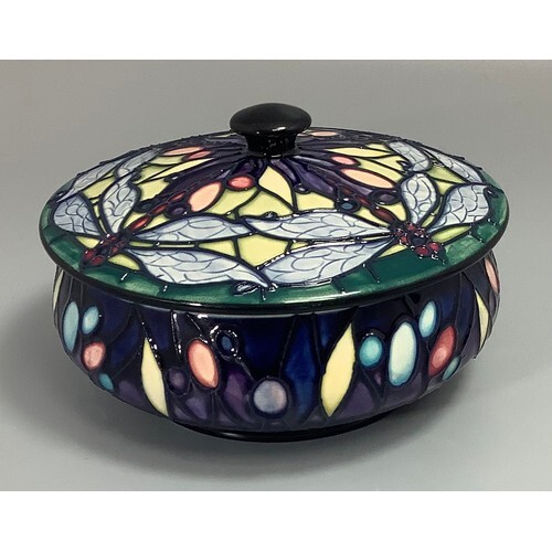 A Moorcroft pottery bowl and cover decorated in the 'Favrile...