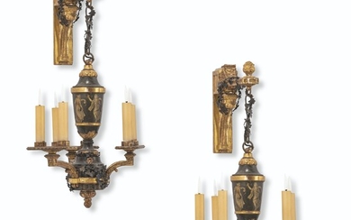 A PAIR OF NORTH ITALIAN GILTWOOD, EBONISED AND TOLE THREE-BRANCH WALL-LIGHTS