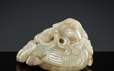 A PALE CELADON AND RUSSET JADE CARVING DEPICTING A PAIR OF MANDARIN DUCKS, LATE MING DYNASTY