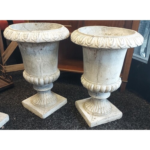 A Pair of Plaster and concrete garden urns [45cm in height]