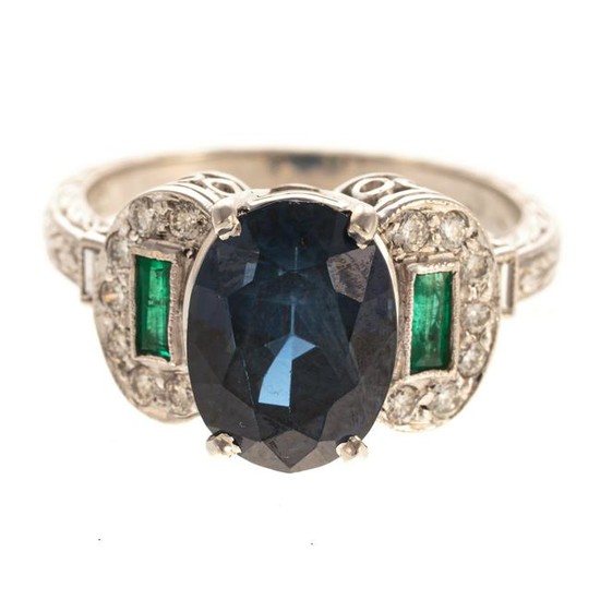 A Platinum Sapphire, Emerald and Diamond Ring