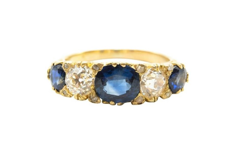 A SAPPHIRE AND DIAMOND FIVE-STONE RING The carved