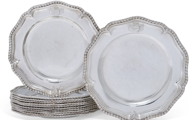 A SET OF TWELVE GEORGE II SILVER DINNER PLATES FROM...