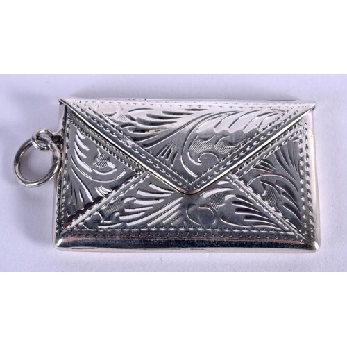 A SILVER TWO COMPARTMENT STAMP CASE IN THE FORM OF AN ENVELO...