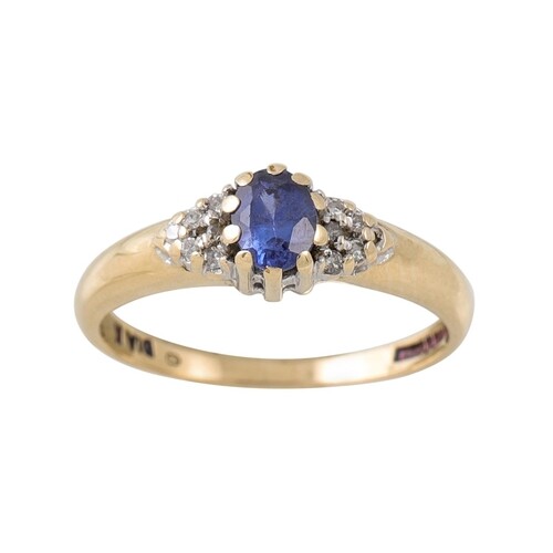 A TANZANITE AND DIAMOND RING, mounted in 9ct gold, size L
