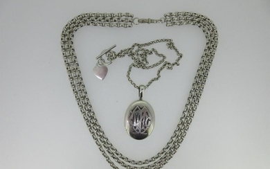 A Victorian silver locket together with a three row