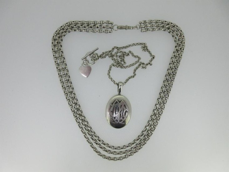 A Victorian silver locket together with a three row