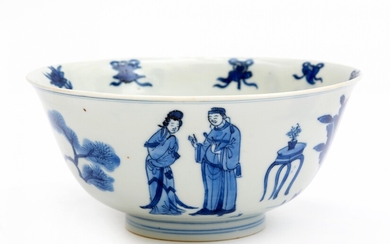 A blue and white bowl with figures