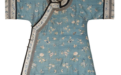 A blue-ground kesi 'floral' lady's robe, Qing dynasty, 19th century | 清十九世紀 藍地緙絲花卉紋夾袍