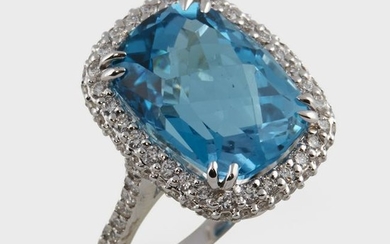 A blue topaz, diamond, and eighteen karat white gold