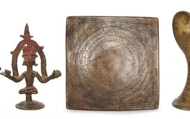 A brass cobra-head lingham, a small bronze...